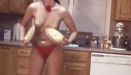 Sexy senora puts pie and cream on her body then fucks herself with vibrator