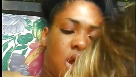 Ebony whore wraps her lips  and pussy around a white cock poolside