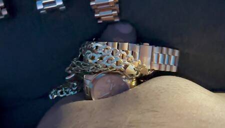 Wristwatch and gold jewelry fetish