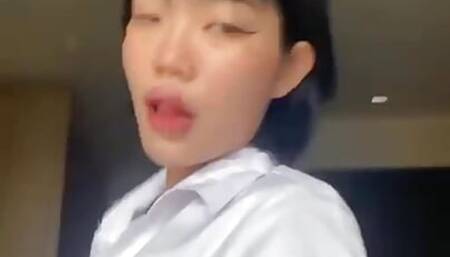 Emma Thai Slutty Teasing in Real University Uniform and Using Sex Toy