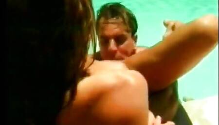 Cock loving brunette sucks studs hard cock poolside