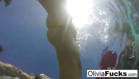 Olivia Austin has some summer fun in the pool