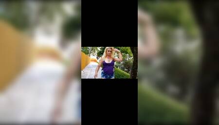 Sol29x this naughty blonde showing off in the middle of a public square