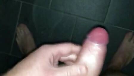 Hot cock cums a load in the shower