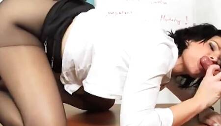 Horny sex in pantyhose and secretary look on the table in the office