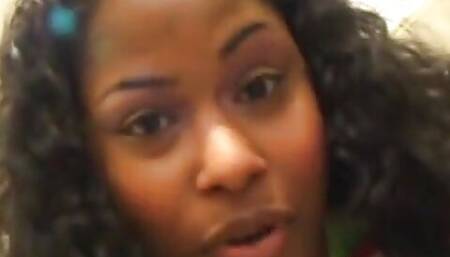 Black beauty lets Wee drip from her juicy twat