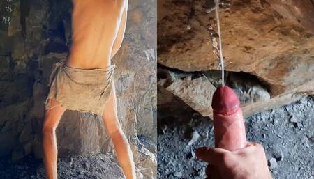 Neanderthal man masturbates his penis in a cave near a fire