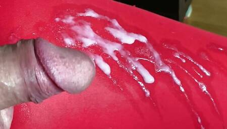 Long handjob session with my red pantyhose and a nice flow of sperm on the red nylon