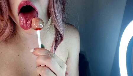 Sucking Chupa Chups and Showing Your Body!!!