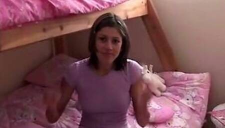 Trixie Teen gets bored and rubs tits