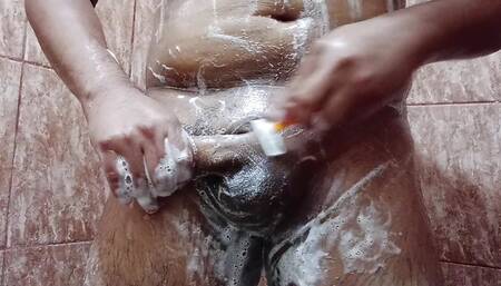 He was shaving his hard cock and his body was more erotic than ever.