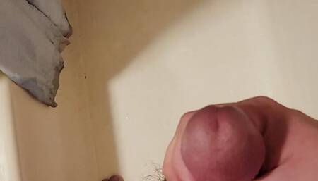 A messy piss and wank before I shower