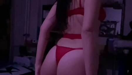 Cute girl teasing her body in her sexy red lingerie