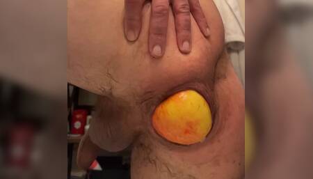 Guy pushes out big apple out of his loose ass