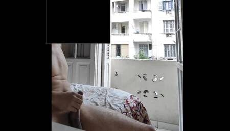 Flashing naked masturbating at open window