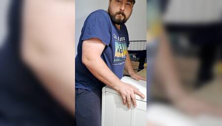 sexy bearded guy makes a dishwasher for him to rub his cock