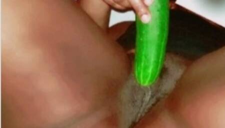 Tight girl masturbating with cucumber