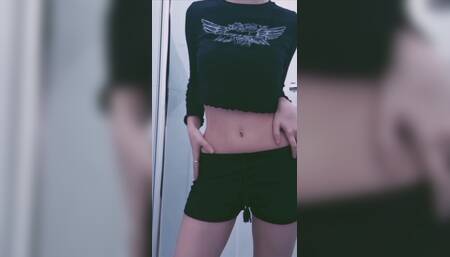 The girl takes off her pajamas and shows herself in lingerie