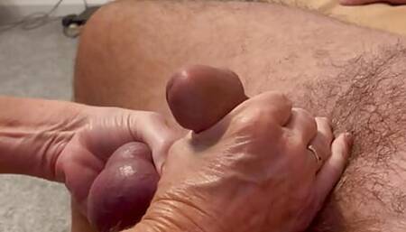 Ball pulling handjob with cum