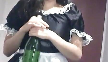 Asian teen fucks her pussy with a champagne bottle