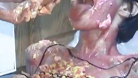 Older and younger lesbians rub food all over each other on the floor