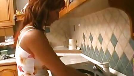 Horny stud loves to give his hard cock to this busty MILF in the kitchen