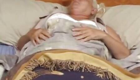 Granny loves to show her affection to this young dude to give him pleasure times