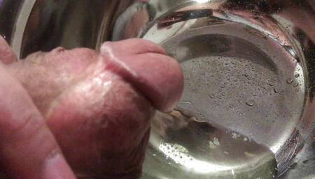 Freak cock pisses a bladder full of air