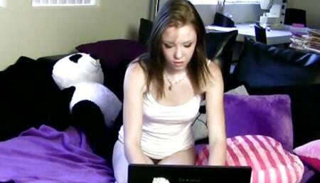 Webcam teen teasing the camera fondling