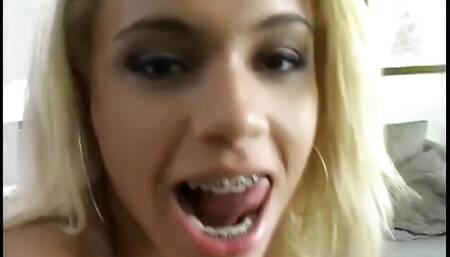 Naughty young blonde with braces enjoys taking dick in her twat and mouth