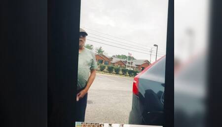 Wanking off with traffic passing