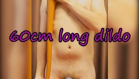 Young guy in chastity cage put very long 60cm dildo in the ass