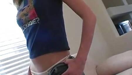 Petite stripteasing teen pulls away her bikini