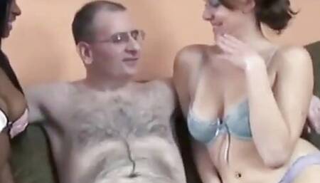 Two hot ladies takes turns in sucking guy's cock