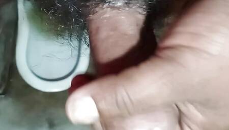 Bengali boy playing with his penis in the toilet at midnight