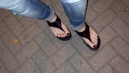 I tempt you with my sexy feet while walking on the street