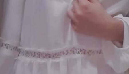 the baby in the bathroom undresses and plays with tits in front of the camera