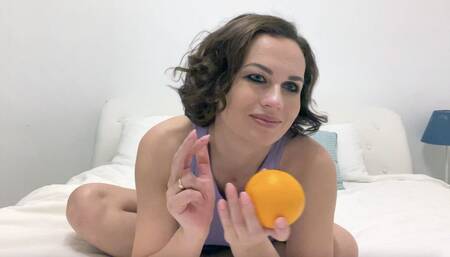Hot MILF Plays Orange with Her Sensual Long Legs!