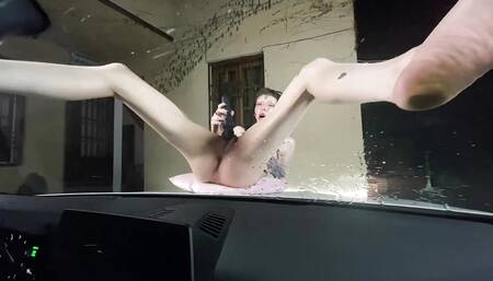 Squirt on the windshield from an informal girl