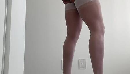 Sissy Wearing White Mini Skirt and Stockings