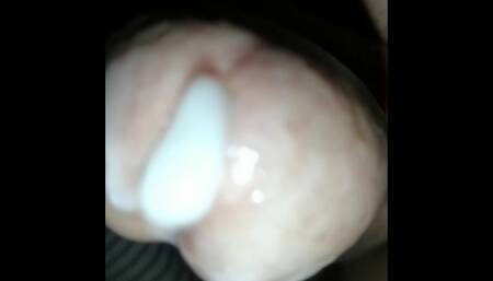 Shemale gets a Mega handjob with double cum at the end