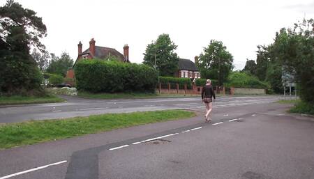 West Malling, Maidstonenakedman in see through black, cars go past