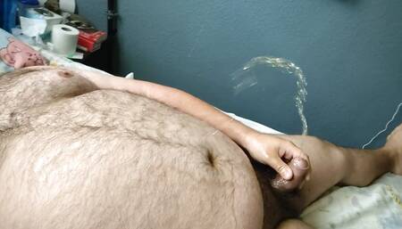 Big Hairy Bear Pissing on Himself in Bed