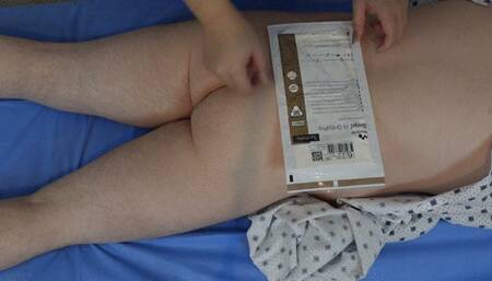 Close up of Doctor fingering and pegging her patient's ass