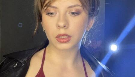 smoking white cigarette in leather jacket