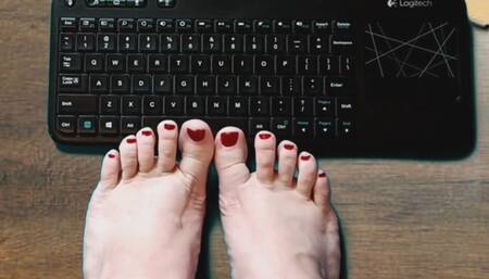 Ruby's Rosy Toes Kicking it on the Keyboard