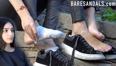 Alicia removes her black sneakers and white socks while sitting, revealing her petite feet (13463) HD