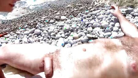 German slut with short hair fucking on the secret beach