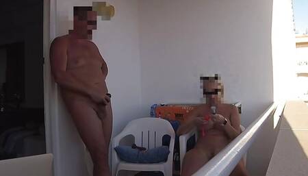 Mutual masturbating on balcony