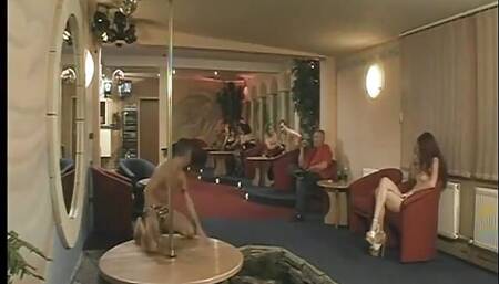 Skinny older slut dances topless on a stripper pole and then begins the mature orgy